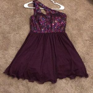 Purple and sequin forms dress